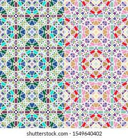 Vector seamless pattern background with different geometrical shapes of multiple colors. Illustration with symmetrical design.