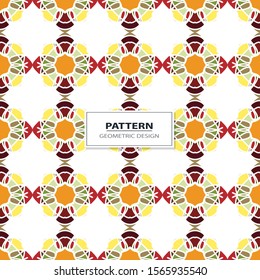 Vector seamless pattern background with different geometrical shapes of multiple colors. Illustration with symmetrical design.