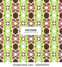 Vector seamless pattern background with different geometrical shapes of multiple colors. Illustration with symmetrical design.