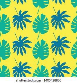 Vector seamless pattern background with green and blue tropical leaves on neon yellow background. Great for textiles, clothing, wallpaper.