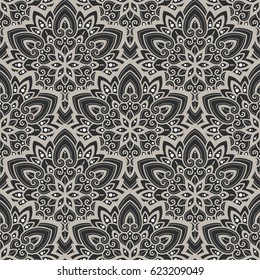 Vector seamless pattern background on the basis of a mandala design. Elegant luxury texture for wallpapers, backgrounds and page fill.