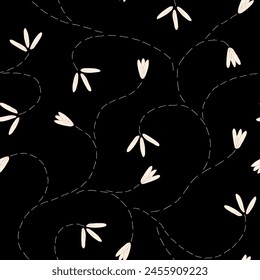 Vector seamless pattern background: Sprouting At Night. This trailing pattern features tiny white flowers and buds with dashed lines stems on a black background. Part of Les Petites collection.