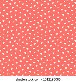 Vector seamless pattern background in trendy color of 2019, living coral, with abstract doodle hearts.