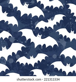 Vector seamless pattern with bats. Halloween illustration. Grunge background with drops and splashes