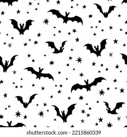 Vector seamless pattern with bats and stars. Halloween design for wrappings, textile, wallpaper and backgrounds.