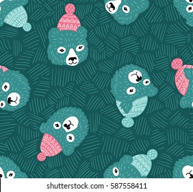 Vector seamless pattern with bears heads. Winter blue background.