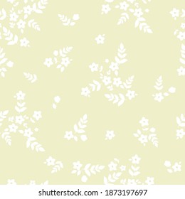 Vector seamless pattern. Beautiful pattern in abstract white colors. Small white flowers and leaves. Pale yellow background. Elegant template for fashionable prints.