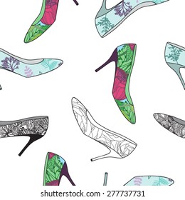 Vector seamless pattern with beautiful colorful shoes