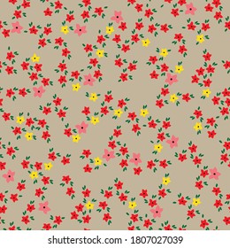 Vector seamless pattern. Beautiful pattern in a small flower. Small pink, red and yellow flowers. Light background. Ditsy flower background. Elegant template for fashionable prints.
