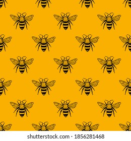 Vector seamless pattern with bees. Black and yellow texture