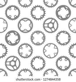 Vector seamless pattern with bike chainrings (chainwheels, sprockets) isolated on white background.