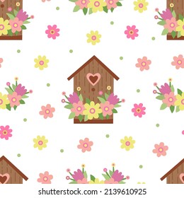 El vector es un patrón sin fisuras con casas de pájaros decoradas con flores de primavera coloridas. Excelente para tela, papel de envoltura, diseño de Pascua. Dibujo manual de ilustración plana sobre fondo blanco.