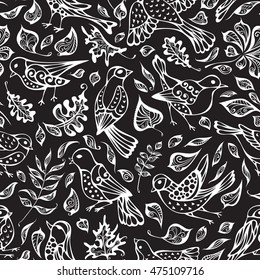 Vector seamless pattern of birds and leaves. Hand-drawn chalk nature boundless blackboard background. Oak, maple, birch, rowan, chestnut leaves.