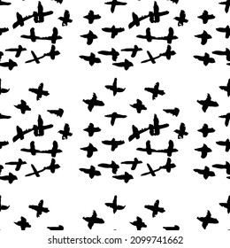 Vector seamless pattern with black crosses on white background. Ink brush strokes. Hand drawn grunge texture.