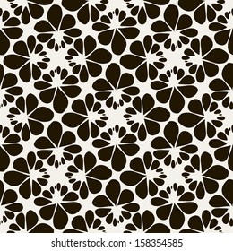 Vector seamless pattern with black flowers. Graphic repeating texture