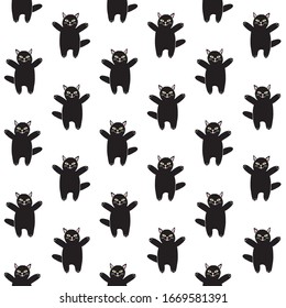 Vector seamless pattern of black hand drawn doodle sketch cat isolated on white background