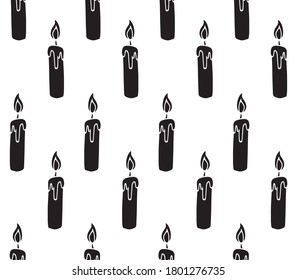 Vector seamless pattern of black hand drawn doodle sketch candle isolated on white background