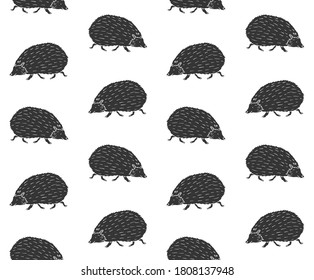 Vector seamless pattern of black hand drawn doodle sketch hedgehog isolated on white background