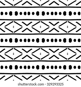 Vector seamless pattern with black hand drawn ornaments on white background. Seamless pattern can be used for textile, wallpaper, wrapping paper, web
