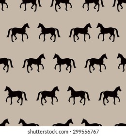 Vector seamless pattern with black horses silhouettes