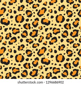 Vector seamless pattern of black leopard spots isolated on yellow background 