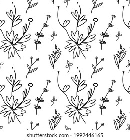 Vector seamless pattern in black and white with flowers, branches and berries.Botanical print in doodle style hand drawn on white isolated background.Designs for textiles,wallpaper,web,packaging.