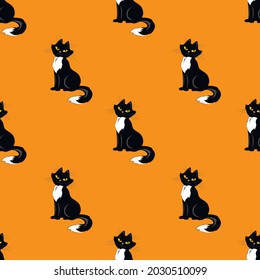 Vector seamless pattern. Black and white cute cartoon cats on orange background. Design with animals, pets for  wallpaper, textile, wrapping paper, notebook cover. Halloween decor.