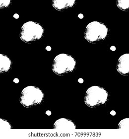 Vector seamless pattern. Black and white round brush strokes. Grungy hand drawn circles. Abstract paint spots, polka dot. Monochrome design