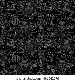 Vector seamless pattern with a blackboard with doodle drawings. White chalk drawings on a black background