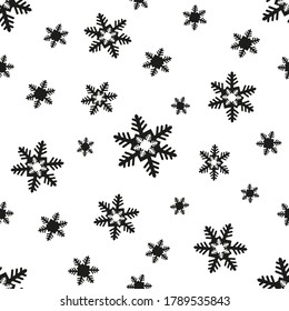 Patrón vectorial transparente de copos de nieve blanco-negro. Invernal Año Nuevo Navidad patrón sin fisuras para imprimir en papel, textiles, embalaje, papel pintado.