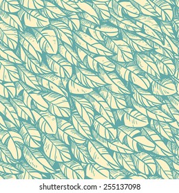 Vector seamless pattern with blue feathers on beige background