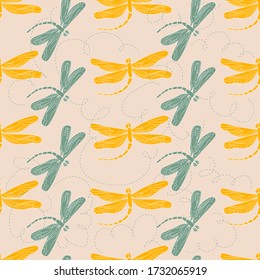 Vector seamless pattern with blue and yellow dragonflies on a light background. Abstract seamless pattern for wrapping paper design. The natural texture of luxury.