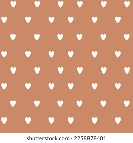 Vector seamless pattern with boho hearts. Cute love background. Brown background and white hearts