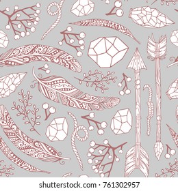 Vector seamless pattern in Boho style with arrows of feathers, plants, stones and rope.