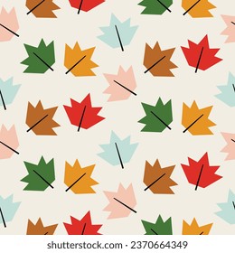 Vector seamless pattern of bright colored autumn leaves. 