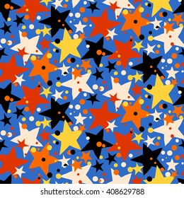 Vector seamless pattern with bright colorful stars and dots on blue background. Fun ditsy print with night sky, constellations and twinkle lights. Concept of astrology and birthday and holiday spirit