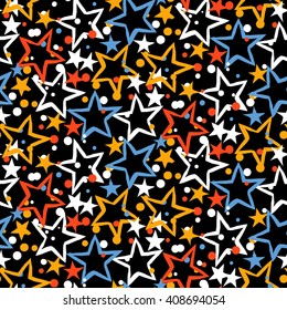 Vector seamless pattern with bright colorful red blue stars, starburst and dots on black background. Ditsy print with fireworks and twinkle lights. Concept of birthday celebration and holiday spirit