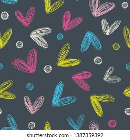 Vector seamless pattern with bright hearts on a dark background.