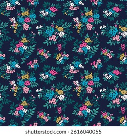 Vector seamless pattern. Bright pattern in small flowers. Small colorful flowers. Dark blue background. Ditsy floral background. Vintage template for fashion prints. Stock vector. Fashion fanky print