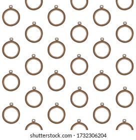 Vector seamless pattern of brown colored hand drawn doodle sketch embroidery hoop isolated on white background