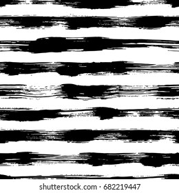 Vector seamless pattern with brush stripes and strokes. Black color on white background. Hand painted grange texture. Ink geometric elements. Fashion modern style. Endless fabric print. Retro.