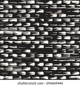 Vector seamless pattern with brush stripes and strokes. Black and white background with ink line elements. Hand painted grunge texture.