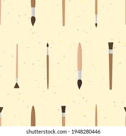 Vector seamless pattern with brushes and paint splashes on yellow background. For wallpapers, decoration, card, print for fabric or bag, cover of notebook, art cover, gift and wrapping paper.