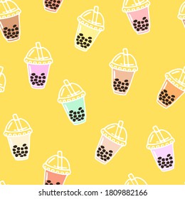 Vector seamless pattern with bubble tea in plastic cups with straw. Popular drink with tapioca pearls. 