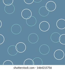 Vector seamless pattern of bubbles on the blue background. Wrapping, fabric, cover design.