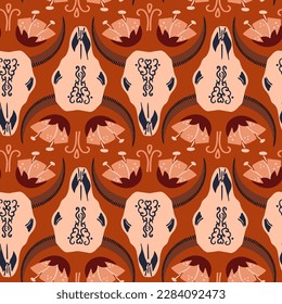 Vector seamless pattern with bull skulls and flowers