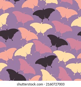 Vector seamless pattern with butterfly silhouettes. A simple illustration in pink and purple colors. Drawing for print and fabric.