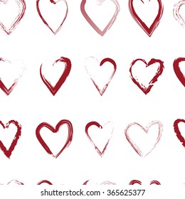 Vector seamless pattern with calligraphic brush hearts. Red on white  background.