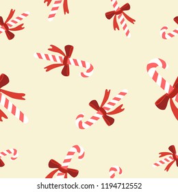 Vector seamless pattern candy cane on a white background. Seamless texture for wallpaper, web page background, wrapping paper, New Year textile in retro style.