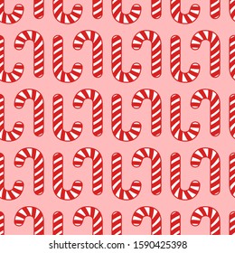 Vector seamless pattern from candy canes. Design for Christmas wrappings and backgrounds